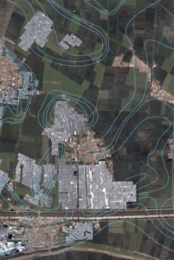 This undated combination map overlay image,&nbsp;released by the Egyptian Supreme Council of Antiquities on Sunday, displays a color satellite image with radar imaging in monochrome. The radar readings&nbsp;show the outlines of streets, houses and temples underneath the green farm fields and modern town of Tel al-Dabaa, in Egypt.